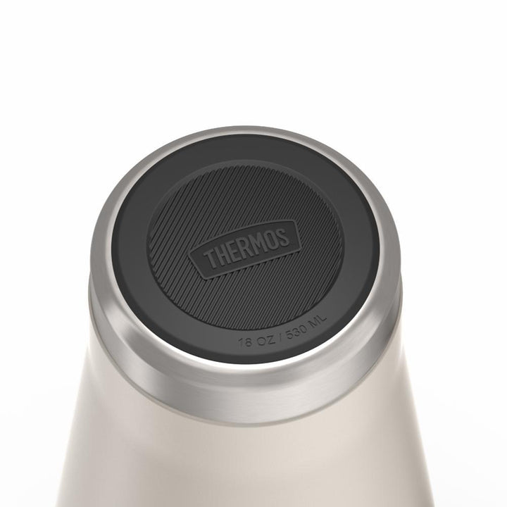 Thermos 18 ounce Stainless Steel Mug with handle and slide lock lid, base view of non-slip base, Sandstone Beige.